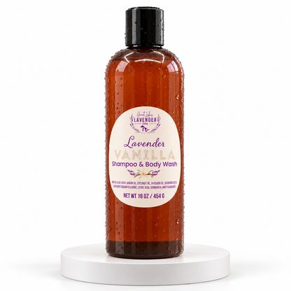 Lavender Vanilla Shampoo & Body Wash in amber 16 oz bottle with black cap on white pedestal.