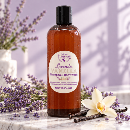 Lavender Vanilla Shampoo & Body Wash with vanilla pods and lavender sprigs against a purple wall.