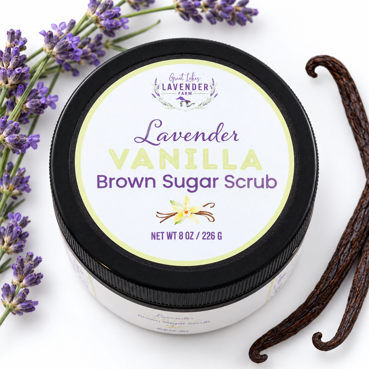 Lavender Vanilla Brown Sugar Scrub jar lid, top view, with lavender sprigs and vanilla beans on white