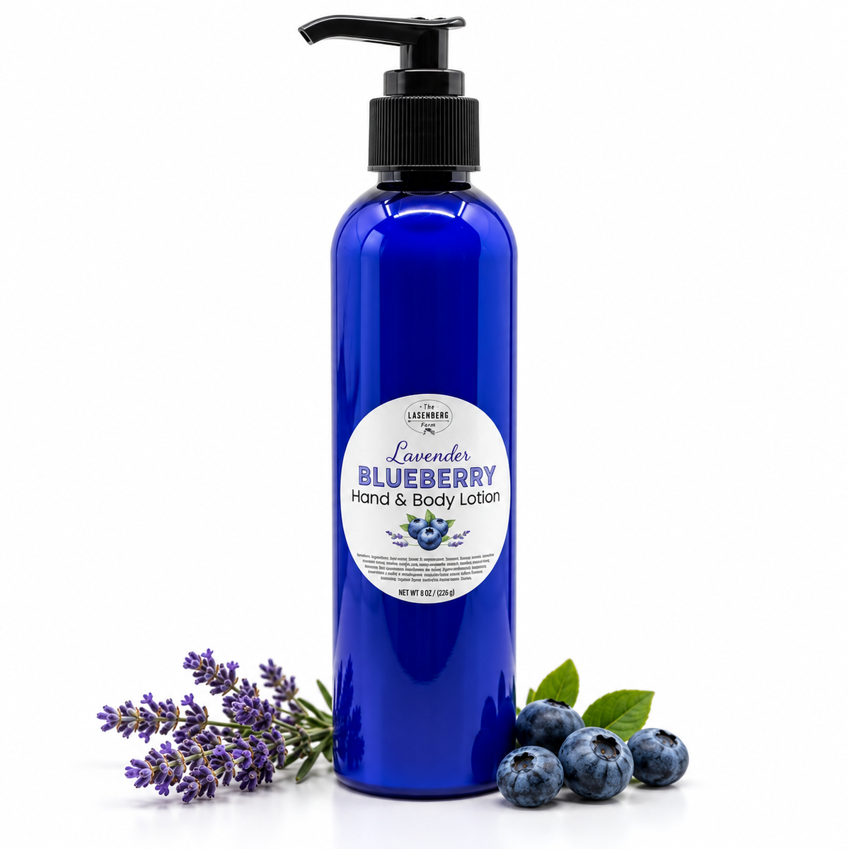 Lavender Blueberry Hand & Body Lotion in a blue pump bottle with lavender sprigs and blueberries on white