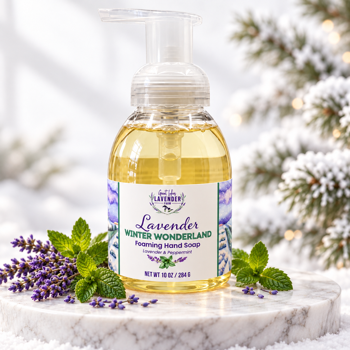 Winter Wonderland foaming hand soap on marble with lavender sprigs and mint