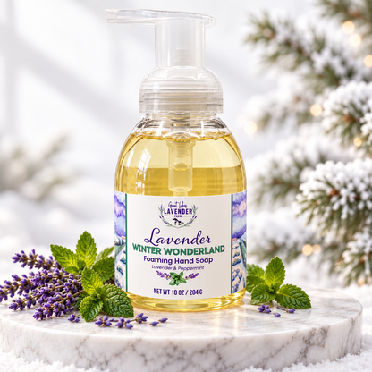 Winter Wonderland foaming hand soap on marble with lavender sprigs and mint
