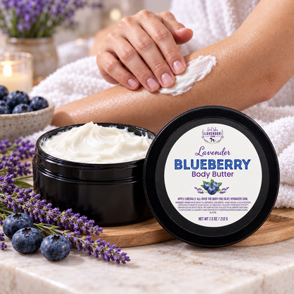 Lavender Blueberry Body Butter open jar on marble as a person rubs the cream into their forearm