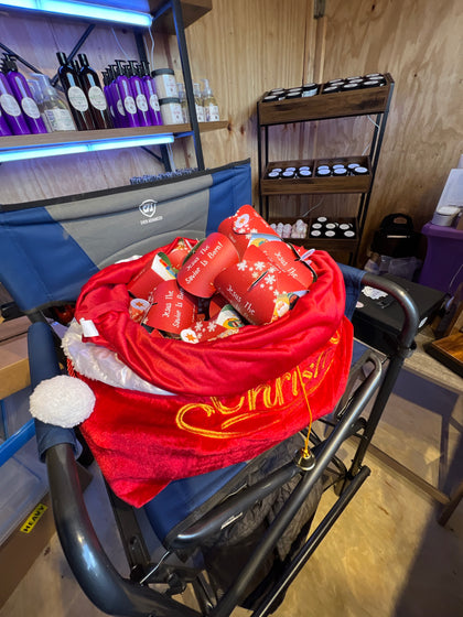 Santa sack full of free Jesus the Savior Is Born gift boxes